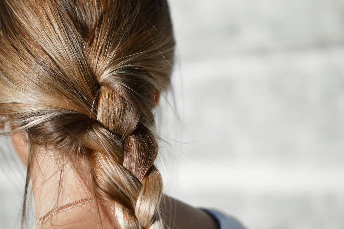 Woman comparing effective vs ineffective hair vitamins that work